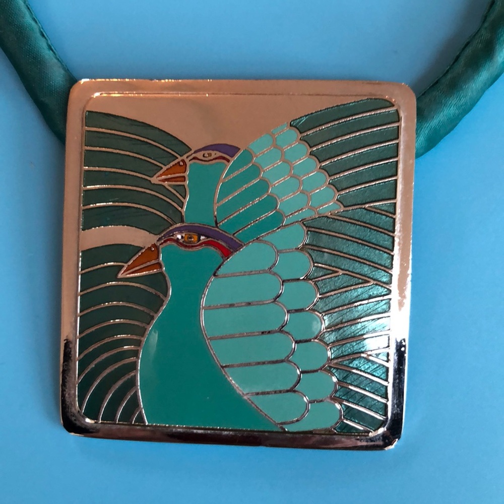 Vintage Laurel Burch pendant on silk cord